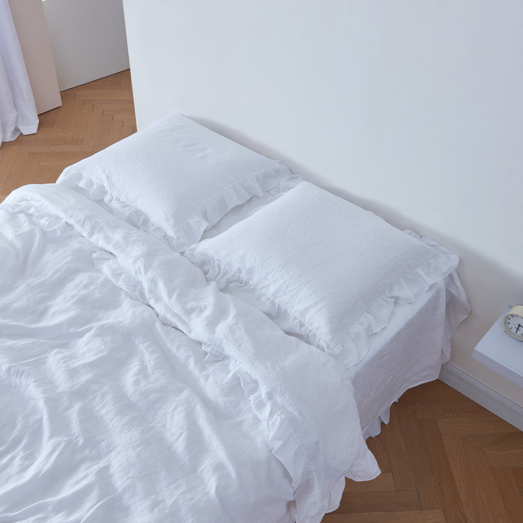 Optic White 100% Linen Ruffle Hem Euro Pillowcases On Bed - linenforce