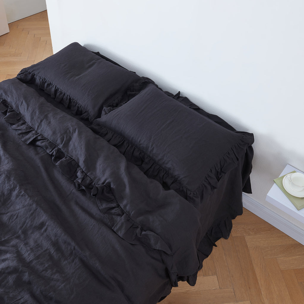 Black 100% Linen Ruffle Hem Pillowcases On Bed - linenforce