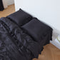 Black 100% Linen Ruffle Hem Euro Pillowcases On Bed - linenforce