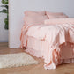Side View Of Peach 100% Linen Duvet Cover With Ties - linenforce