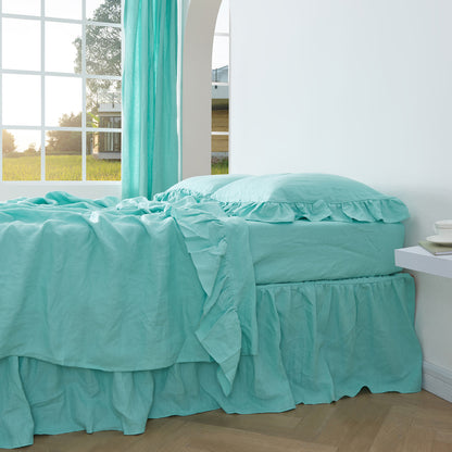 Side View Of 100% Linen Ruffle Hem Flat Sheet On Bed - linenforce