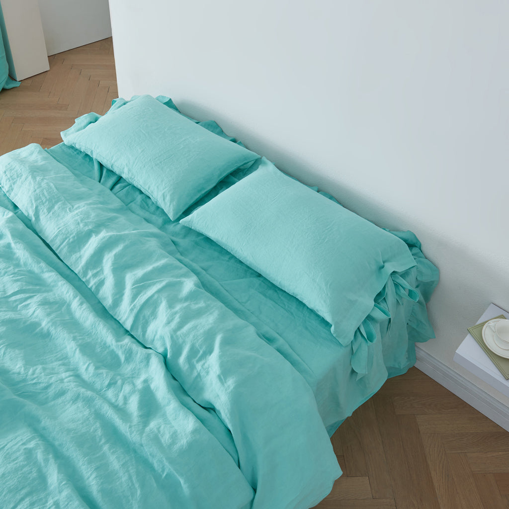 Aqua Green 100% Linen Bow Ties Pillowcases On Bed - linenforce