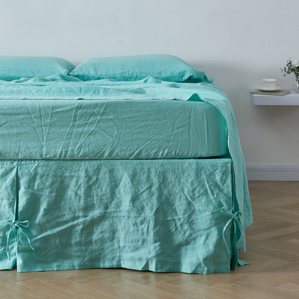 Aqua Green Linen Side Pleated Bedskirt with Knots on Bed