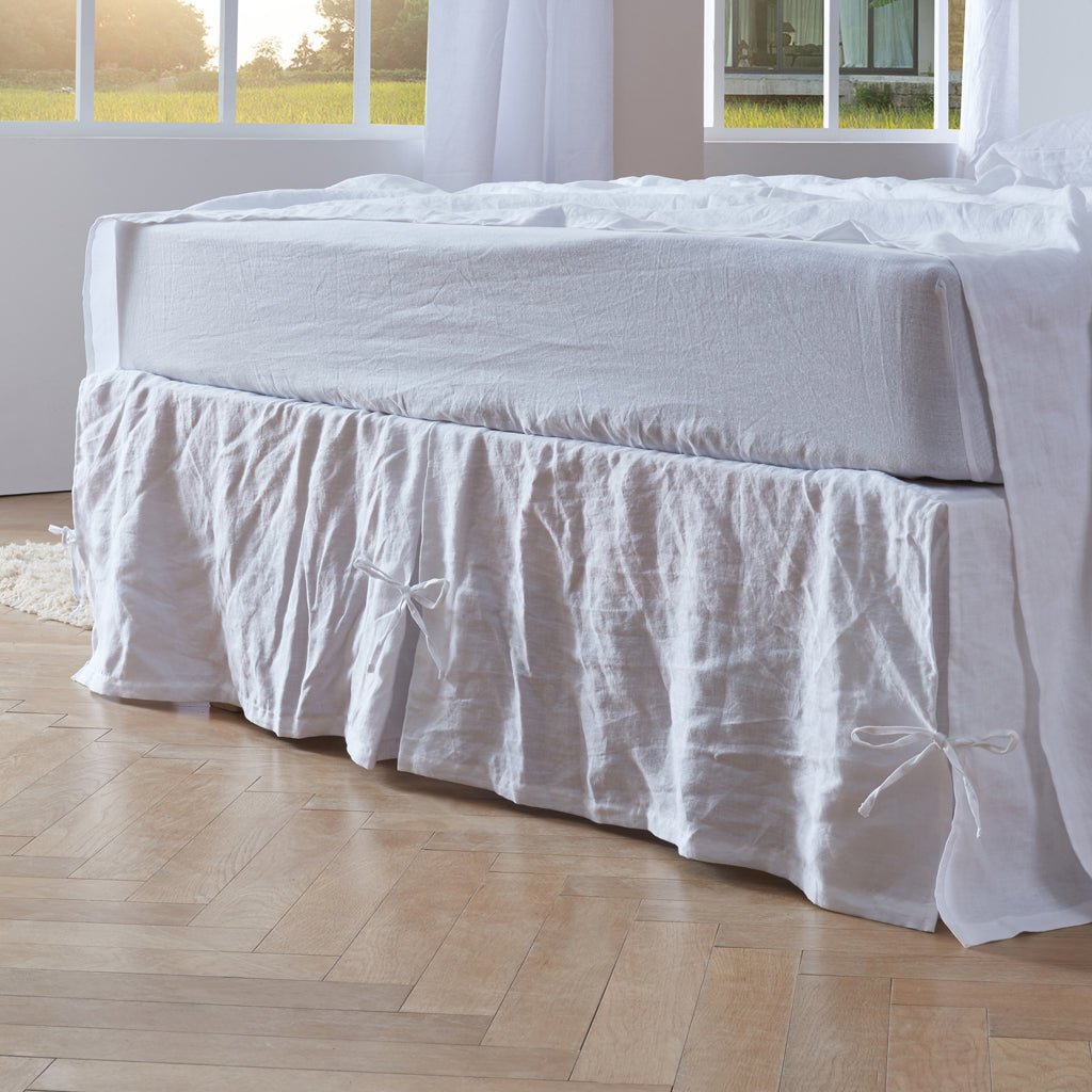 Knotted Optic White Linen Bedskirt on Bed