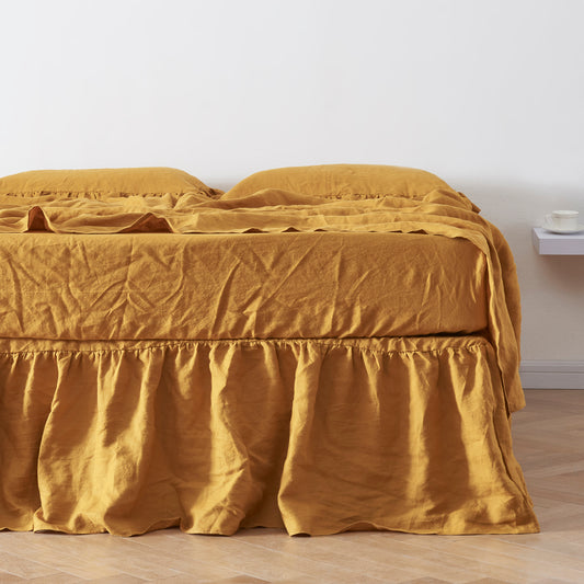 Mustard Linen Gathered Dust Ruffle on Bed