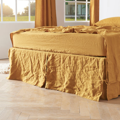 Mustard Yellow Knotted Linen Bedskirt on Bed