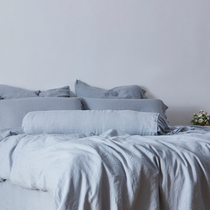 Alloy Gray Linen Bow Ties Bolster Pillow on Bed