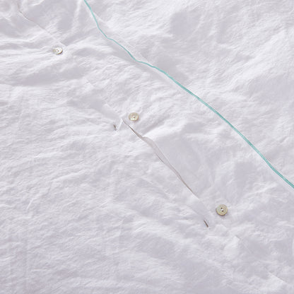 Button Detail on White Linen Duvet Cover with Aqua Embroidery Edge