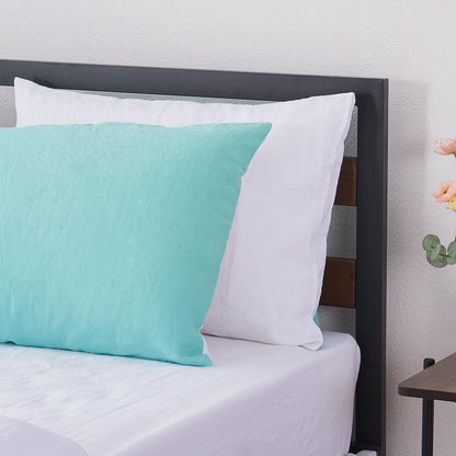 Two Tone Aqua Green and White Linen Pillowcases on Bed