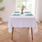 Aqua Green Edge Embroidered Linen Tablecloth on Table