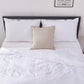 100% Linen White Duvet Cover with Beige Embroidered Edge on Bed with Neutral Throw Pillow