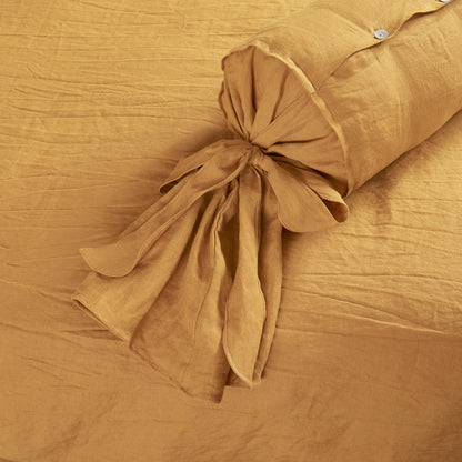 Bow Tie Detail on Mustard Linen Bolster Pillowcase