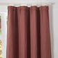 Close-up of the top of rusk red linen drapery