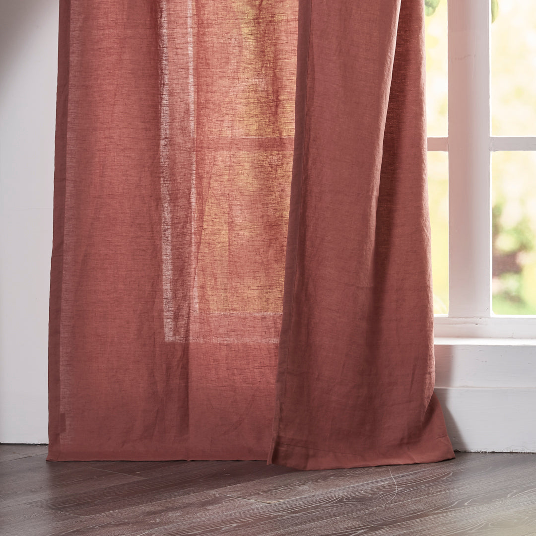 Close-up of 100% linen rusk red curtain hems