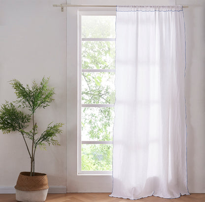 White Linen Curtain with Brilliant Blue Embroidered Edge on Window