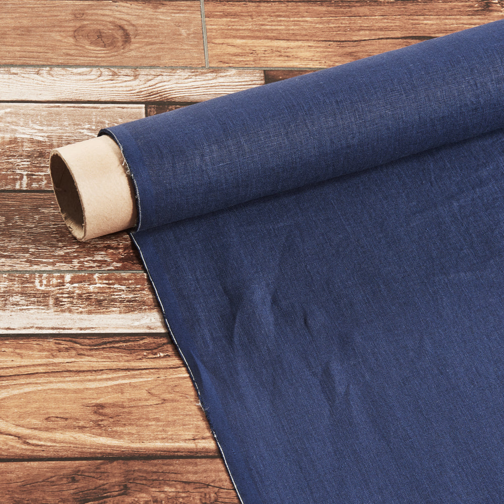 Roll of 100% linen fabric in indigo blue