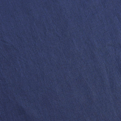 Close up of 100% linen fabric in indigo blue