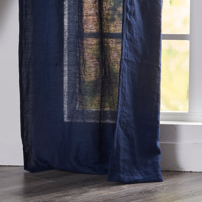 Hem of Indigo Blue Linen Curtain Panel on Window