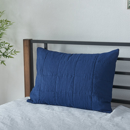 Quilted Linen Pillow Sham in Indigo Blue on Bed