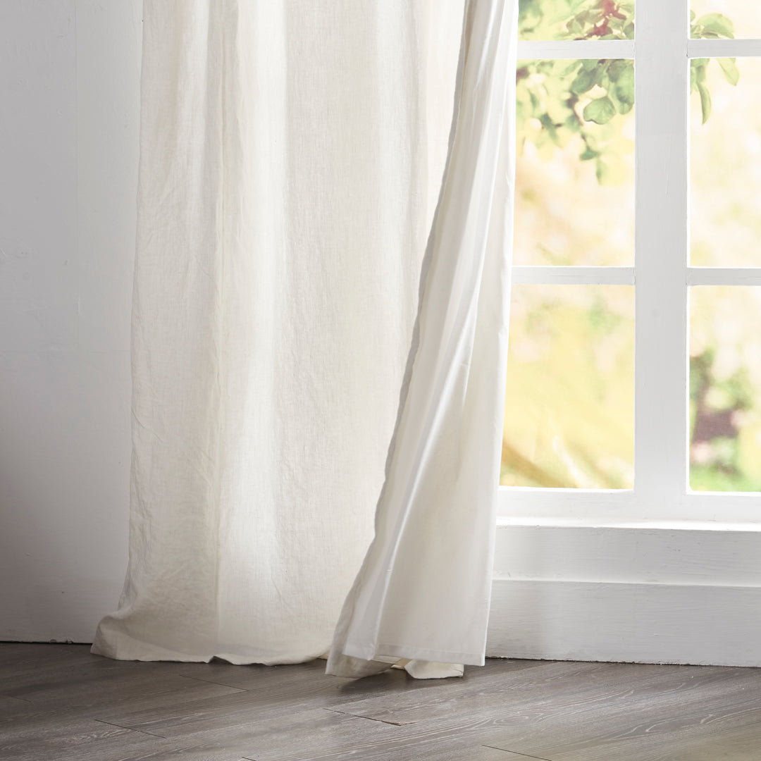 Hem of Ivory Linen Curtain With Cotton Lining