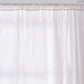 Detail of White Linen Curtain with Mustard Yellow Embroidered Edge on Window