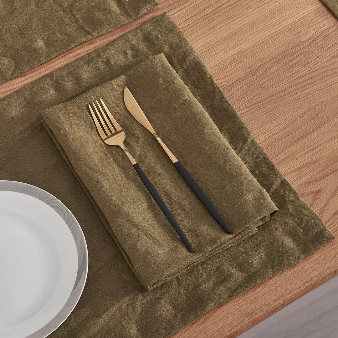 Olive Green Linen Napkin in Place Setting on Table