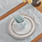 Top view of pale blue 100% linen table napkin