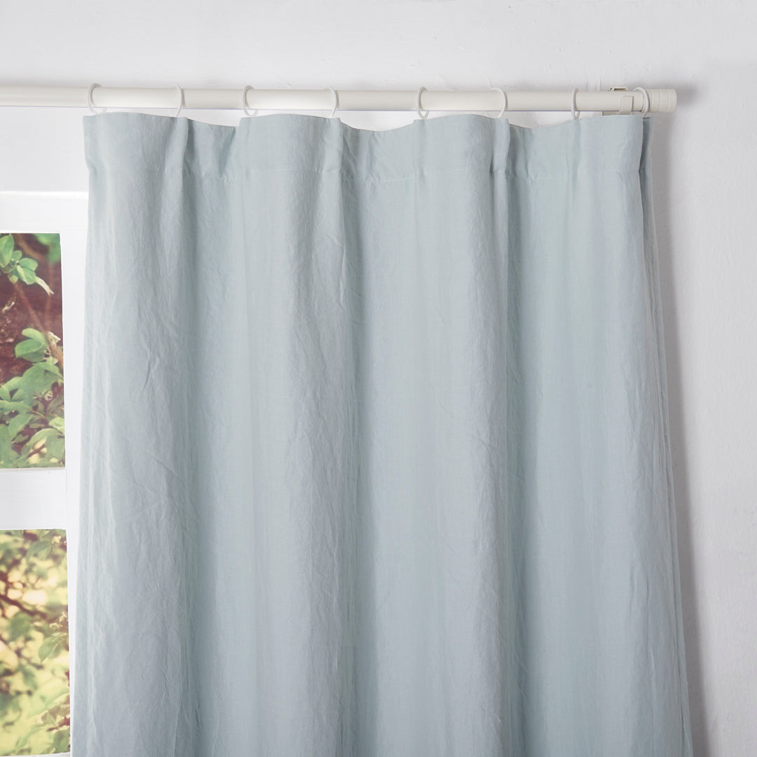 Pale Blue Linen Curtain Hung with Rings