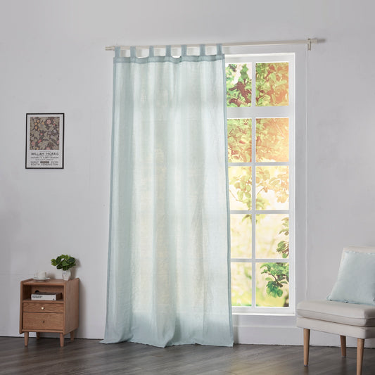 Pale Blue Linen Drapery With Tab Top on Window