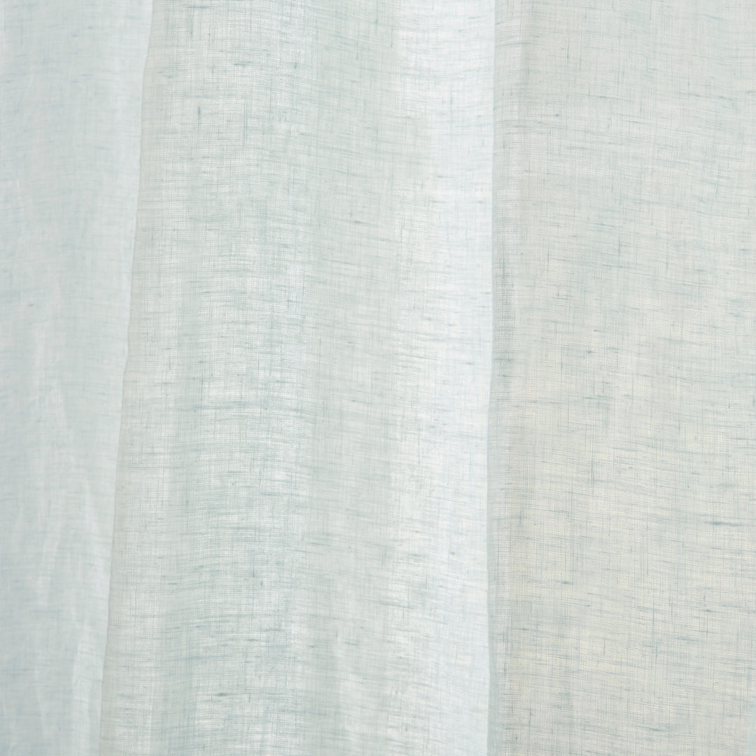 Close-up detail of 100% linen pale blue curtain
