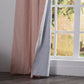 Close-up of 100% linen peach curtain hems with blackout lining