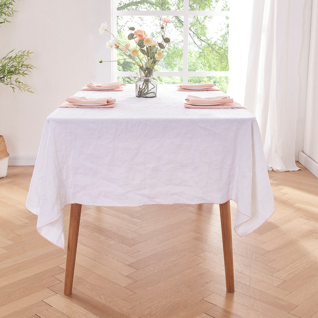 Table Set with White Linen Tablecloth with Peach Embroidered Edge