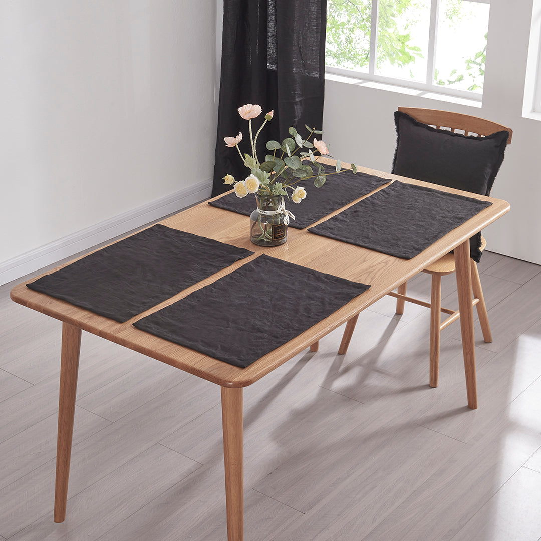 Black Linen Placemats on Table