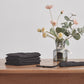 Stack of 100% Linen Napkins in Black on Table