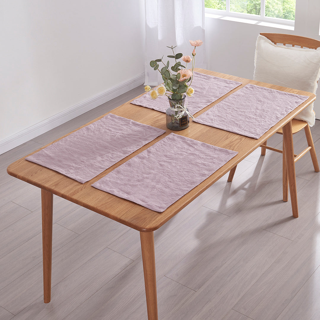 Set of Four Lilac Linen Placemats on Table