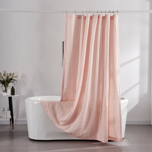 100% linen peach shower curtain draped over ceramic tub