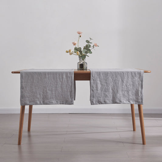 Two Alloy Gray Linen Plain Table Runners on Dining Table