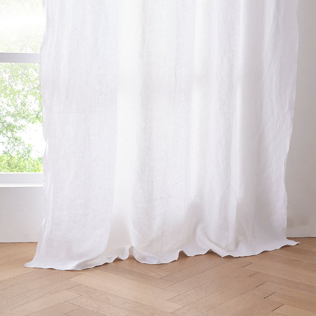 Hem of White Linen Curtain with Embroidered Edge