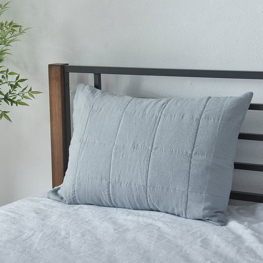 Alloy Gray Linen Quilted Sham on Bed